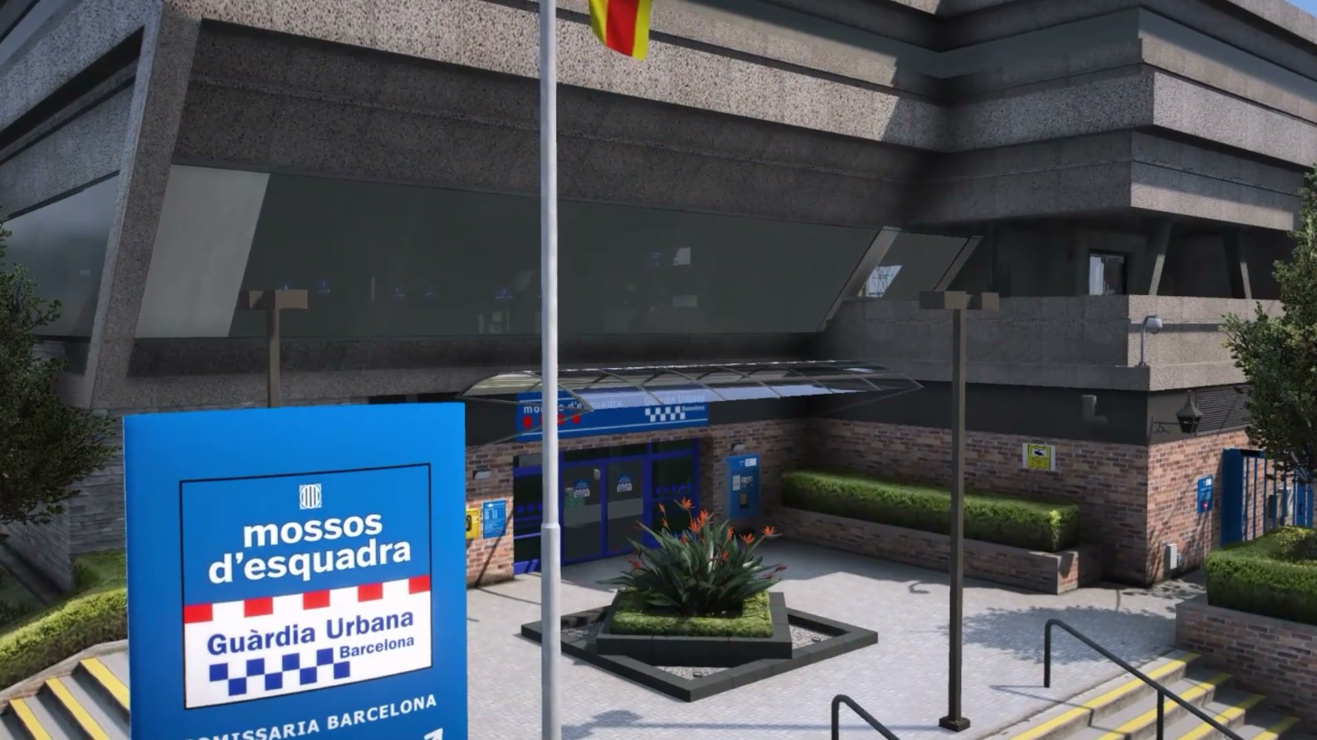 Entrada de una comisaría con el rótulo de Mossos d’Esquadra y Guardia Urbana